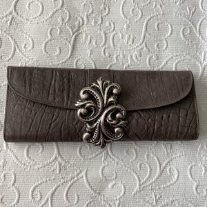 Brave Clutch Handbag